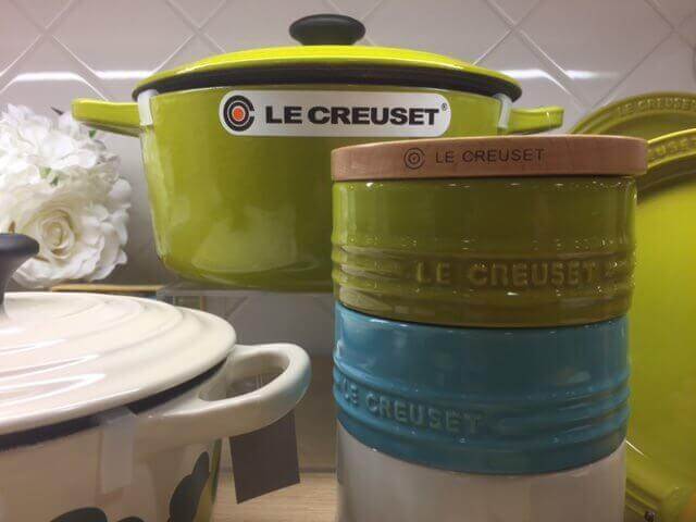 Why buy Le Creuset cookware (picture; display of Le Creuset cookware).