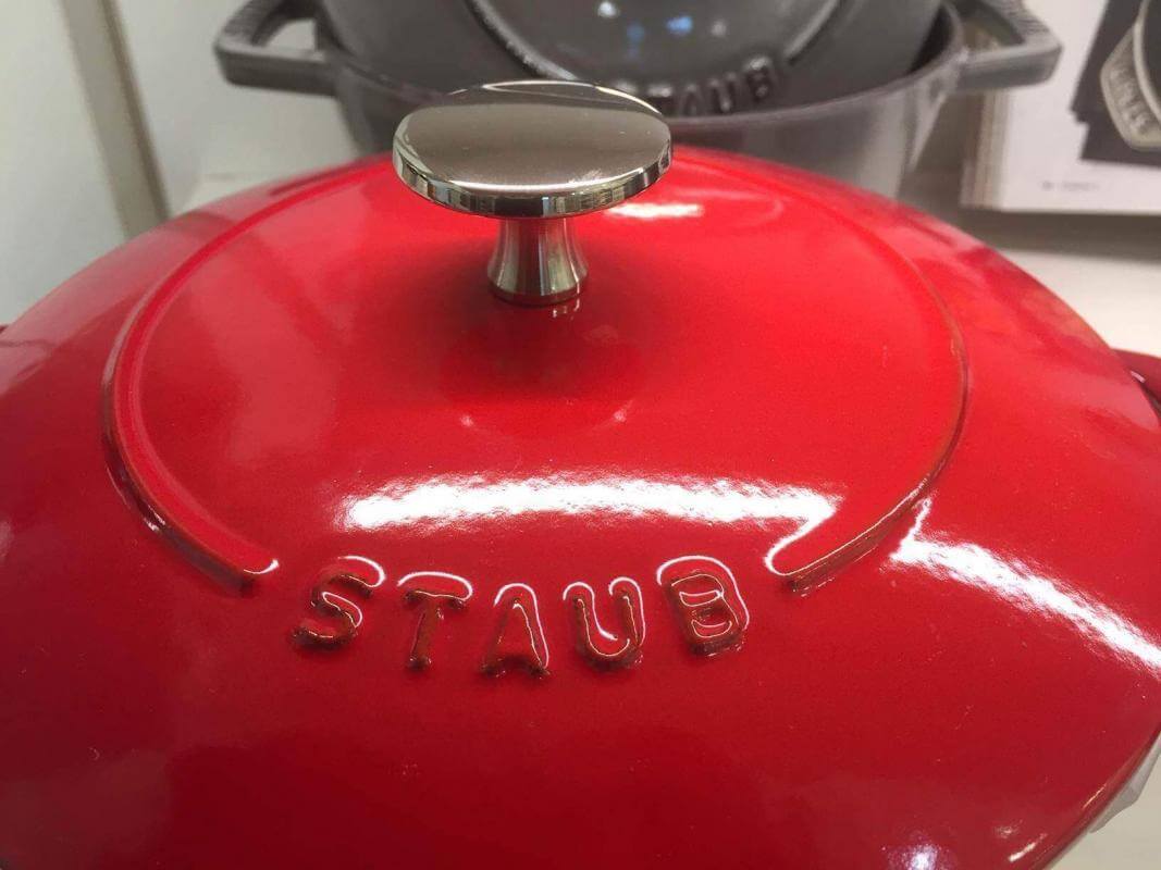 Red Staub French oven on display.