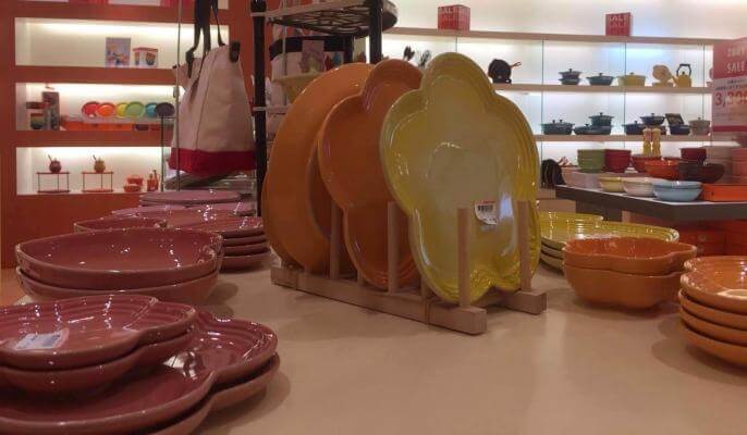 Is Le Creuset worth the price? (In the picture Le Creuset ceramic dishes on display at a Le Crust store).