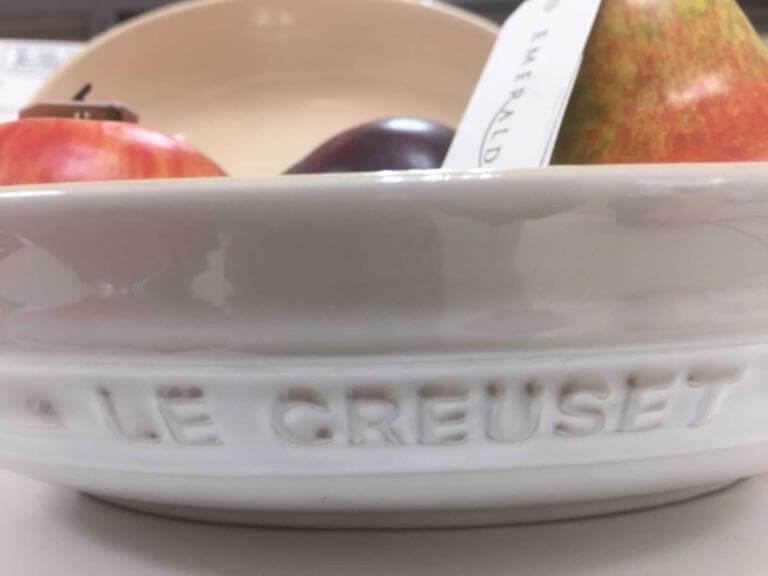 Is Le Creuset ceramic cookware good. (in the picture is a white ceramic bowl filled with fruit).