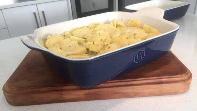 Emile Henry ceramic cookware. (In the picture is a blue Emile Henry baking dish with potato bake ready to go into the oven).