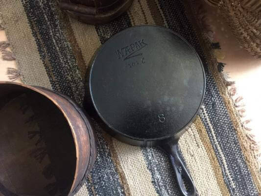 Wapak Hollow Ware Co. Wapak No8 skillet on a table. In the picture, the Z logo is clearly seen.