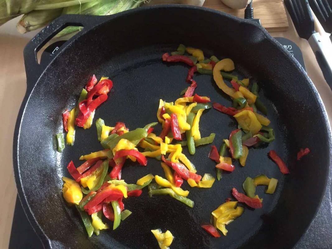 Lodge cast iron skillet with stir fried vegetables.