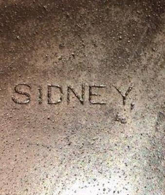 Straight Sidney cast iron logo.