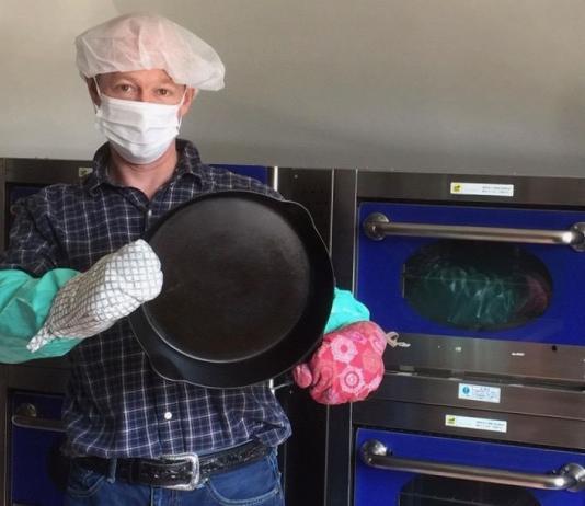 Is cast iron cookware safe to cook with? Boonie Hicks writer holding a cast iron pan.