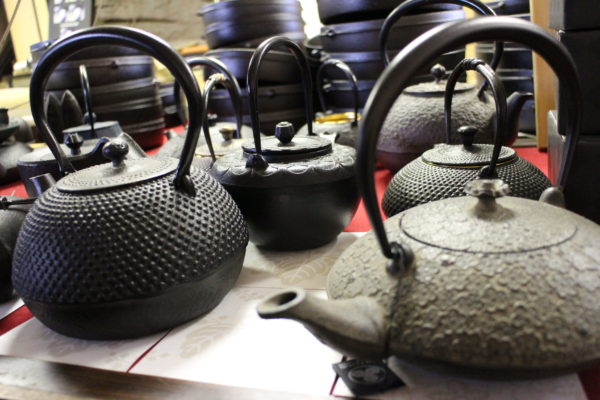 Display of Oitomi cast iron kettles and teapots