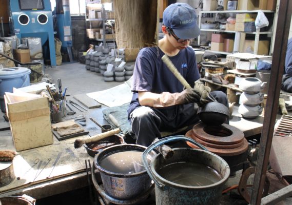 Iwachu cast iron foundry worker