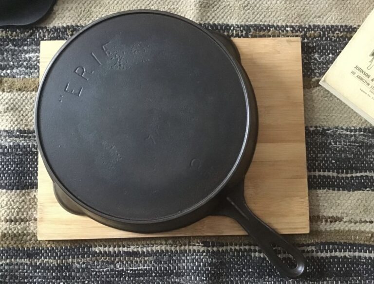 Artistic Erie skillet on cutting board. Learn how to identify your antique Erie skillets.